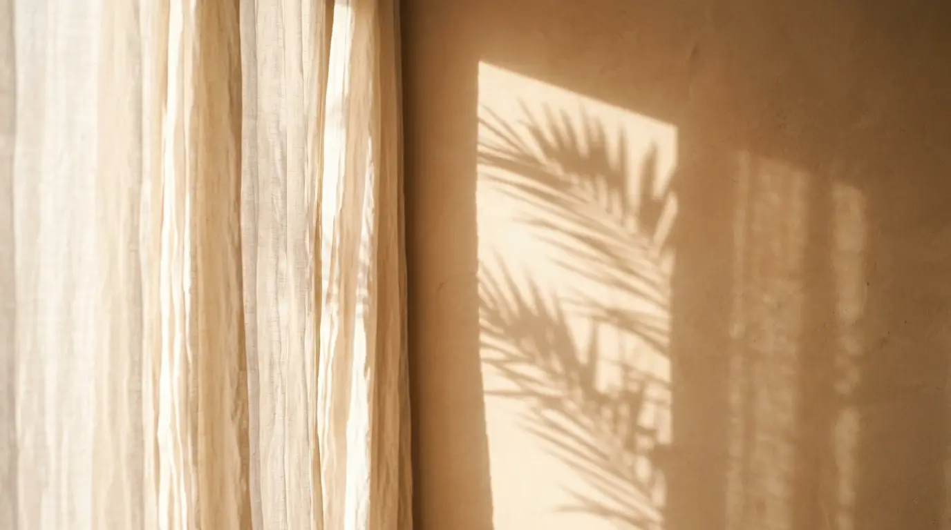 Palm shadows on linen curtains in warm morning light, hormone imbalance article, AWE Aesthetics & Wellness Experience, Pinecrest