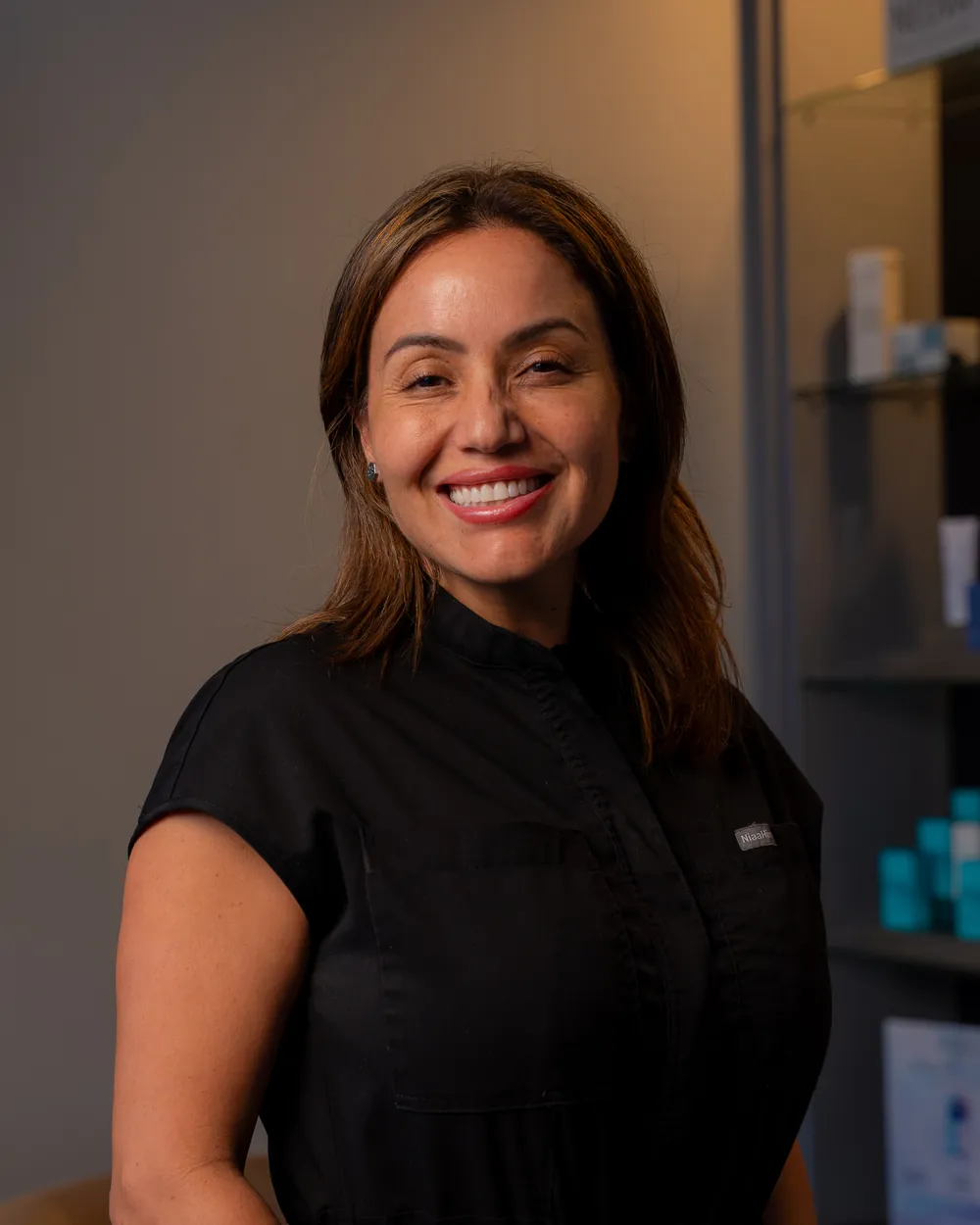 Faby Carr smiling in the AWE lobby