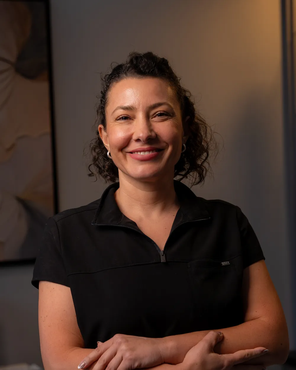 Marcela Botero smiling in the AWE lobby